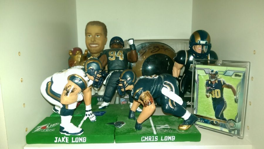 A Rams fan keeps a shrine of memorabilia from several seasons the Rams played in St. Louis. <br />
Photo by Joey Schneider