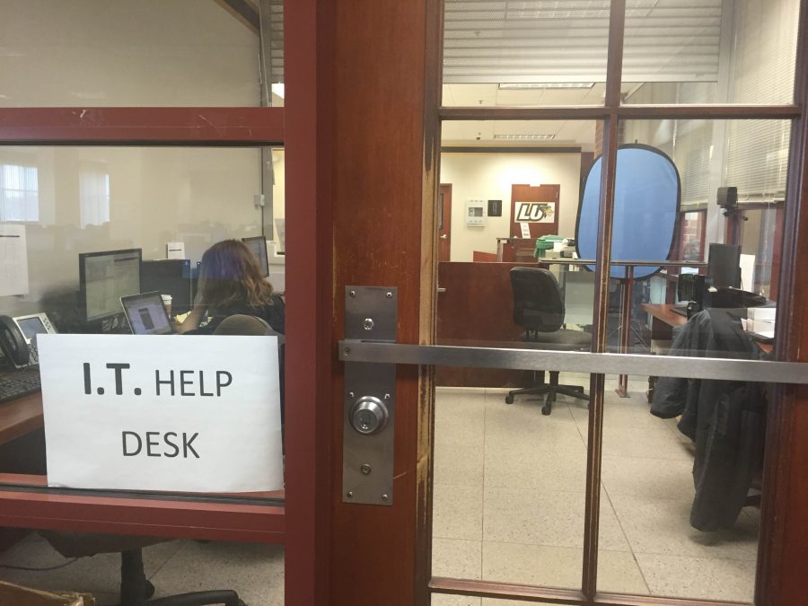 The I.T help desk is located on the third floor of the Spellmann Center. 
<br>
Photo by Devin King