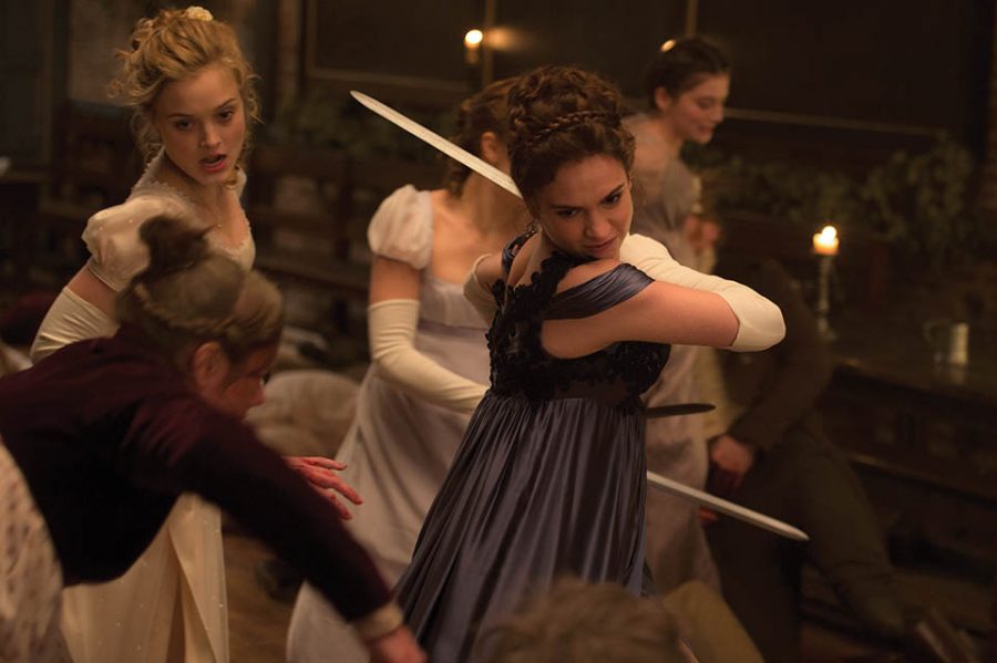 Photo courtesy of Screen Gems
Bella Heathcote and Lily James fight the undead in Pride and Prejudice and Zombies.
