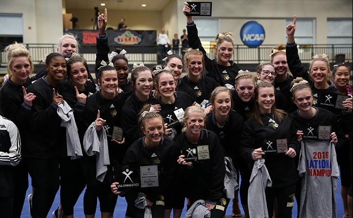 The+Lindenwood+gymnastics+team+poses+on+the+podium+after+winning+the+national+championship.%0APhoto+by+Carly+Fristoe