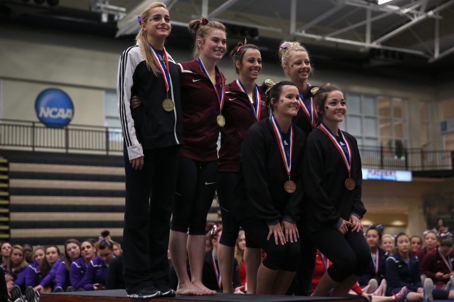 Lindenwoods+Rachel+Zabawa+and+Kayla+McMullen+pose+at+the+bottom+of+the+podium+after+placing+in+the+individuals+finals.++Photo+by+Carly+Fristoe
