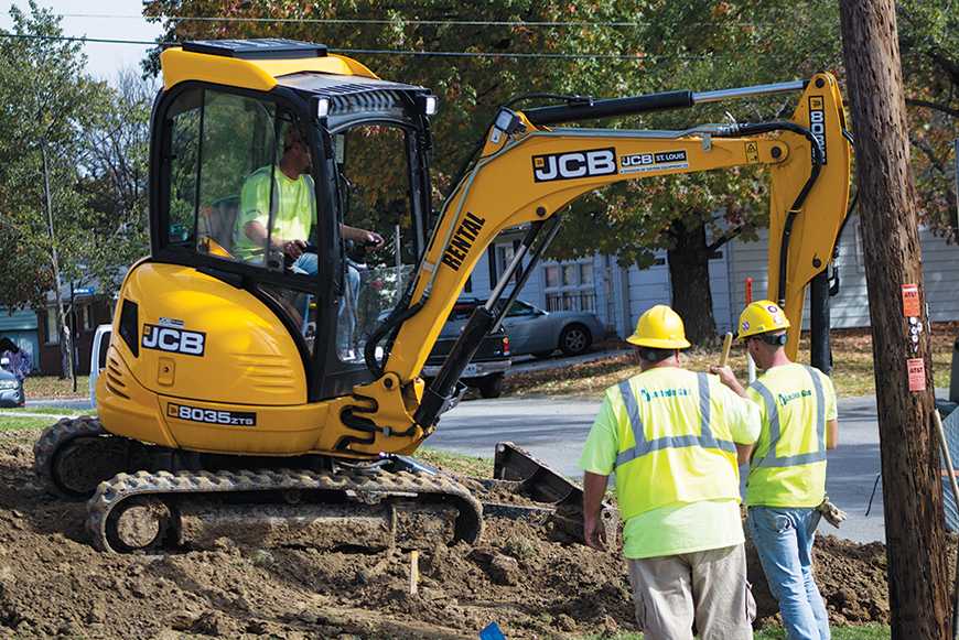 St. Charles City workers dig up the gas main by Droste Road. The main will be moved behind homes. 
 Photo by Kelby Lorenz