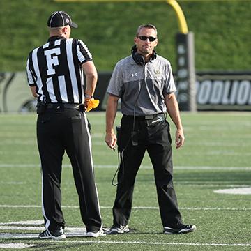 Photo by Carly Fristoe
Former head football coach Patrick Ross looks away after discussing a call with an official during a 2016 home game. 