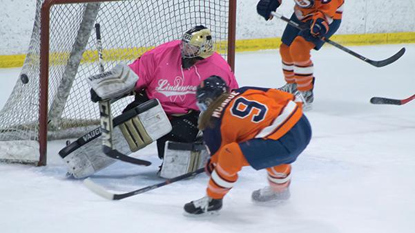 Sophomore Jolene deBruyn tends the net at the annual Pink the Rink game against Syracuse on Jan. 20 at the Lindenwood Ice Arena. The Lions lost the game 5-0.  Photo by Kelby Lorenz