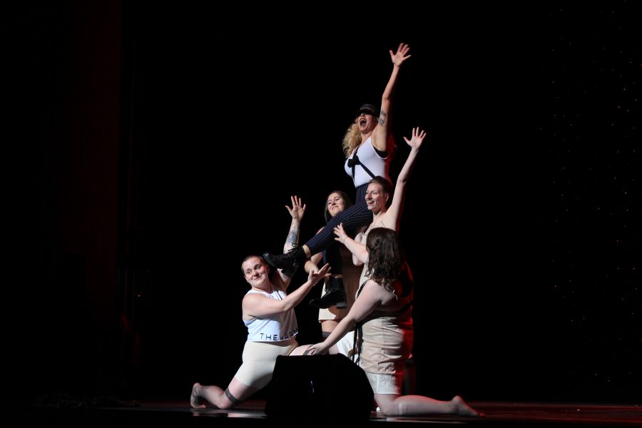 Performers pose for the audience at the end of their number.  Photo by Lindsey Fiala