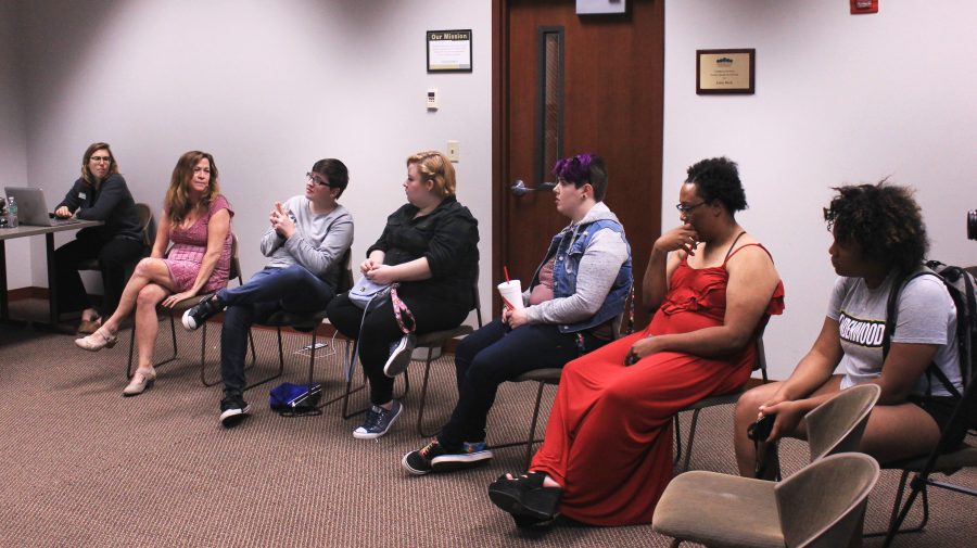 Members of Gender/Sexuality Alliance chat during their first meeting.  Photo by Lindsey Fiala