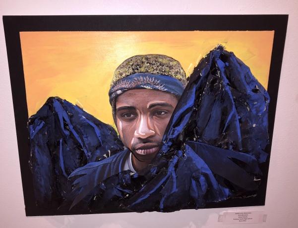 A piece by Parkway South High School student Anna Brackett, titled Malik in the Mountains. Bracketts teacher, Nora Olive, was also credited. Photo by Madeline Raineri. 