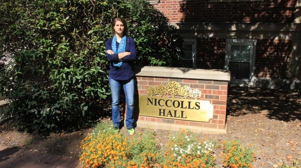 Alumna Aeriel White stands in front of Niccolls Hall at Lindenwood, where she was raped in 2010 during her freshman year.  Photo by Lindsey Fiala