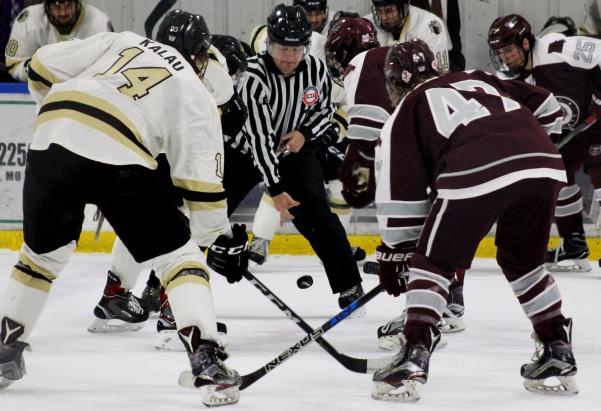 Forward Alex Kalau at the face-off against Missouri State on Nov. 11 at the Wentzville Ice Arena. Kalau had two assists on Dec. 2 against the University of Illinois at the Illinois Ice Arena. File photo by Kayla Bakker.