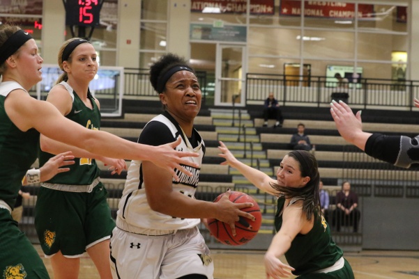 Sara Ross, No. 11, drives in the lane for the bucket in Lions 71-65 loss Thursday night against Missouri Southern. Ross finished the game matching her season high with 20 points.

Photo by Walker Van Way