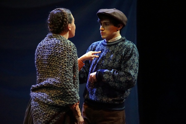 Junior Calyn Roth (left) and freshman Caleb Ellis in The Cripple of Inishmaan. Ellis plays Cripple Billy Claven, the title character, who longs to leave his mundane life to go be a movie star.  Photo by Mitchell Kraus 
