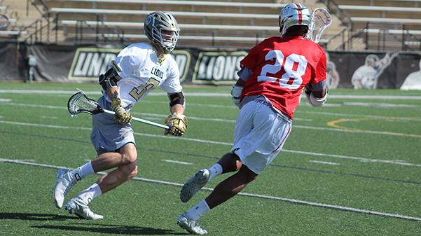 Former Lindenwood lacrosse player Michael Proskey keeps up with Ohio Valley Universitys Kobie Jordan during a game last season on March 4, 2017, at the Hyland Arena.
 Legacy stock photo by Madi Nolte 