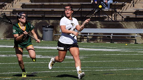 Lindenwood+Universitys+Sami+Smit+outruns+Northern+Michigan+Universitys+Megan+Palacio+during+their+matchup+on+Saturday%2C+March+3+at+the+Harlen+C.+Hunter+Stadium+in+St.+Charles.+%0A+Photo+by+Michelle+Sproat.+