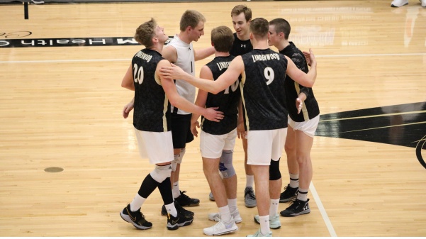 The+mens+volleyball+team+celebrate+winning+a+point+against+Lincoln+Memorial+on+February+3+in+Hyland+Arena.++Photo+by+Joey+Mesenbrink