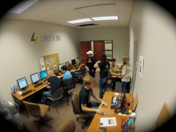Students work in the old journalism lab in Spellmann Center.
