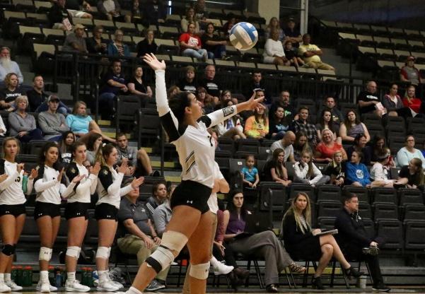 Alexa Pressley serves against the Hornets from Emporia State on Saturday afternoon. Pressley is an outside hitter from Texas. 
 Photo by Mina San Nicolas