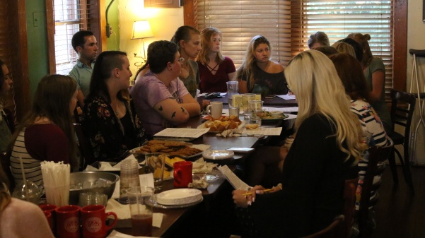 Students from both the St. Charles and Belleville campuses, alumni, LGBTQ community members and Associate Professor Heather Brown-Hudson gather to discuss a response to administration at Crooked Tree Coffee House, Thursday Sept 20.
 Photo by Kayla Drake