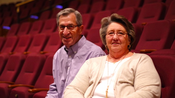 James and Barbara Foster sit in the same seat: aisle center on the balcony every show. The season ticket holders have been going to theater shows for the past five years.
