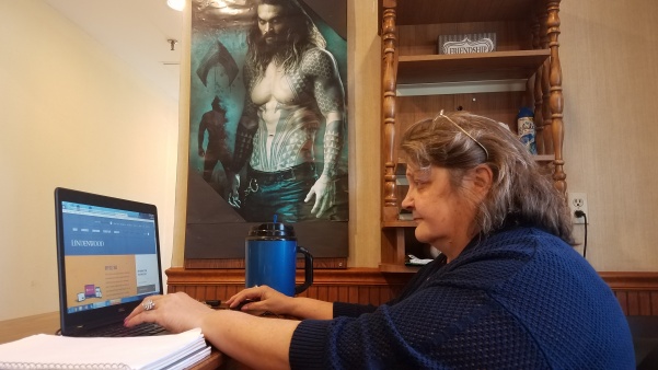 Filkins decorated Linden Lodge for Halloween, placing the most important poster by the desk. She said she loves Aquaman.
“The guys love him too,” she said. “They can’t deny it.”
 Photo illustration by Kayla Drake