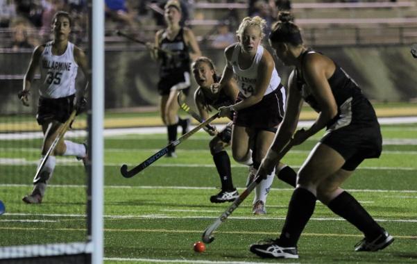 Forward Bridget Hoogendijk (right) scores off a pass from midfielder Caro Theunisz (left), making the fifth goal of the night against Bellarmine University on Oct. 6.
 Photo by Kayla Drake 