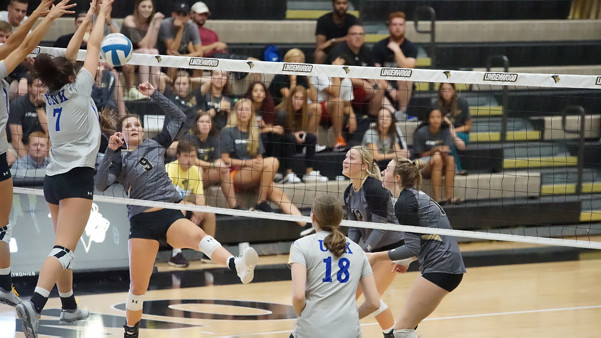 Lindenwood freshman Hannah Borchelt, #9, attacks the ball past defending Nebraska-Kearney Lopers. The Lions put up a good fight but lost the match 3-0.  Photo by Mitch Kraus.