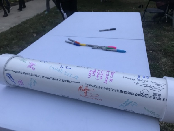 The School of Educations time capsule becoming covered with signatures and filled with momentos. 
 It is set to open again in 100 years.   Photo by Lauren Pennock. 