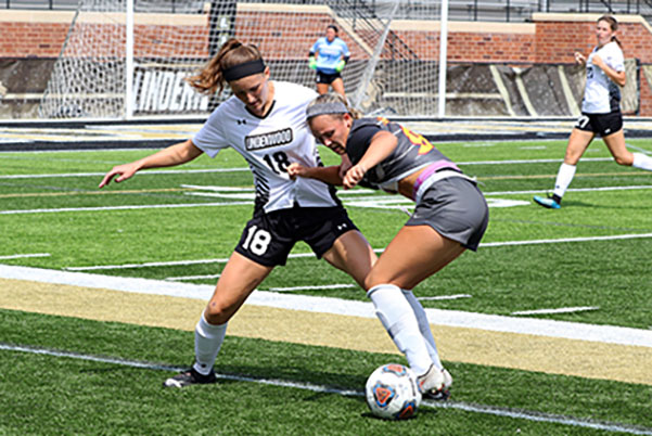 File photo: Alaina White battles a player from the University of Missouri - St. Louis to steal the ball.