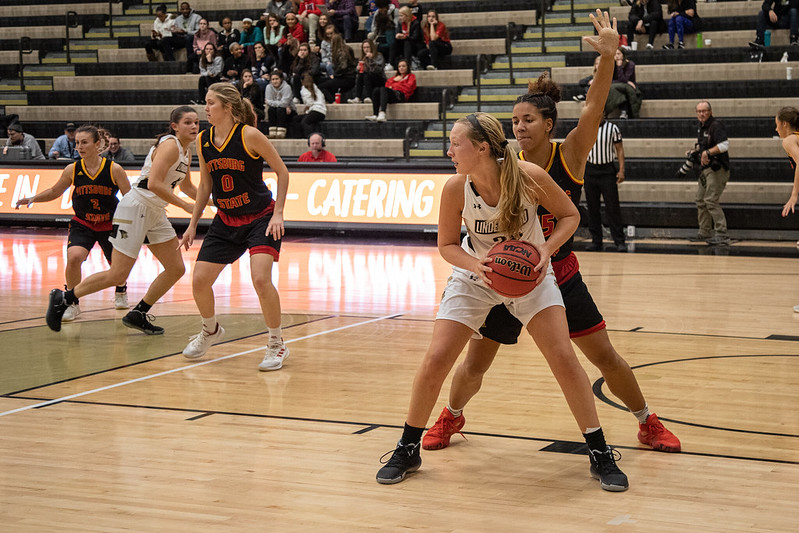 Kallie Bildner (No. 25) holds the ball against a defender in a Nov. 13 contest with Pittsburg State.