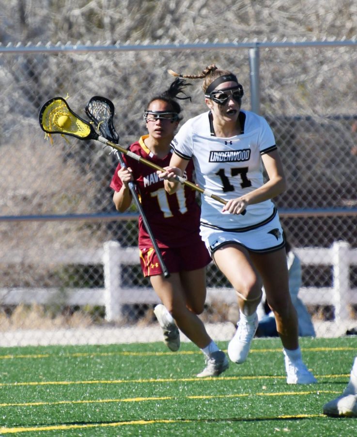 Lindenwoods Carly Fedorowski (17) runs past a defender during the Lions season opener vs. Colorado Mesa on Feb. 8.