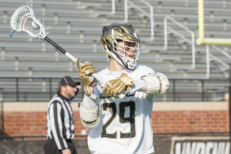 Sophomore+Peter+Covington+holds+possession+for+Lindenwood+during+their+home+opener+on+Feb.+8+against+Florida+Tech.