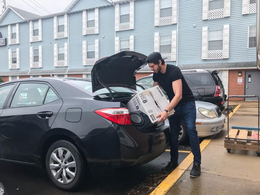 Lindenwood student Bryan Encalada moves out of the Linden Lodge after it was announced that classes would be online for the semester because of the coronavirus.
