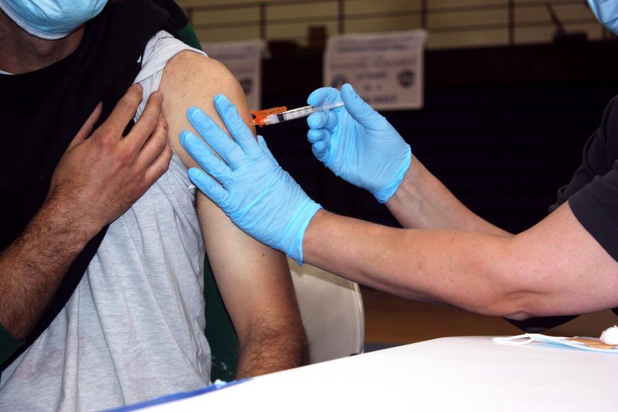 Missouri resident receiving a Moderna COVID-19 vaccine at a vaccination site at St. Louis Community College - Forest Park on May 4, 2020.