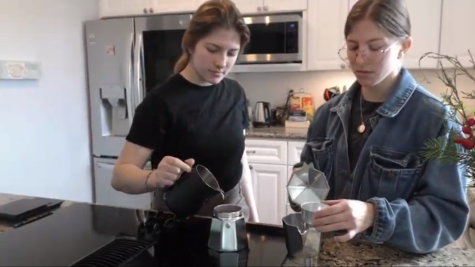 Lindenwood students Bianca Sa (left) and Bruna Sa prepare to make coffee in a kitchen. The sisters began learning about coffee when they were 16.