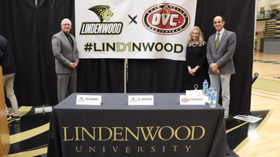 President John Porter (left), Ohio Valley Conference Commissioner Beth DeBauche (center), and Vice President of Intercollegiate Athletics Brad Wachler pose after the university announced its move to Division I and the Ohio Valley Conference. The press conference took place at Hyland Arena on Feb. 23.