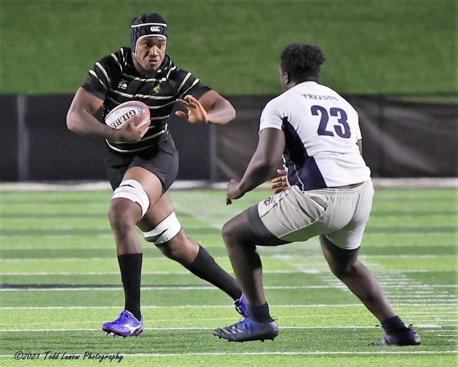 Gabriel+Wai+%28left%29+looks+to+evade+a+defender+during+a+home+mens+rugby+game+at+Hunter+Stadium.+Photo+provided+by+Todd+Lunow.+