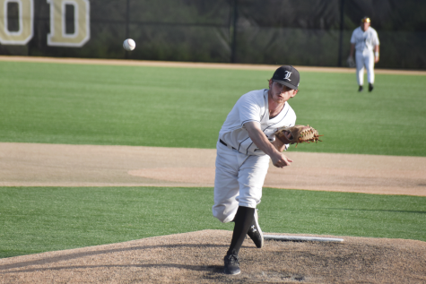 Junior Niko Marshall throws the ball off of the mound during Saturday’s second game against Drury University. The Lions fell to Drury 5-4 in the second game.