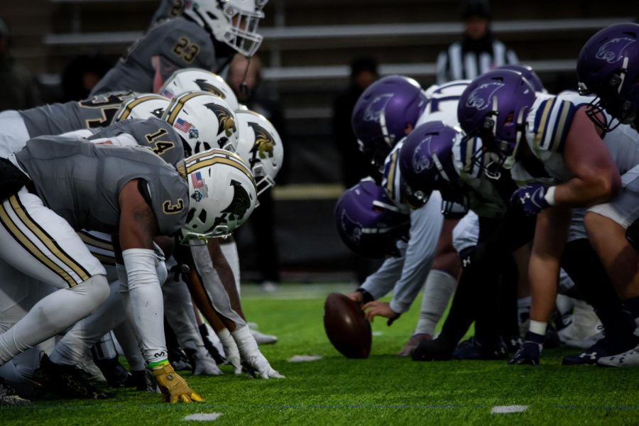 Members of Lindenwood’s defense line up at the line of scrimmage, preparing for a snap by the McKendree Bearcats. 