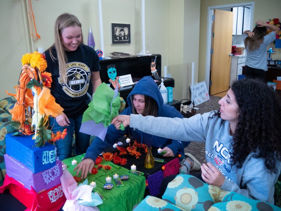 Lindenwood students prepare the altars in McCluer Lounge on Nov. 1
