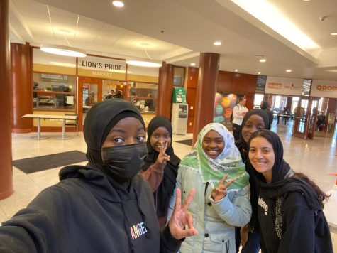 From left: Rahma Kaluone, Fatuma Sam, Tanatswa Beta, Zinat Ologundudu and Hadel Abdelkarim wear hijabs on National World Hijab Day on Feb. 1 in Spellmann.
