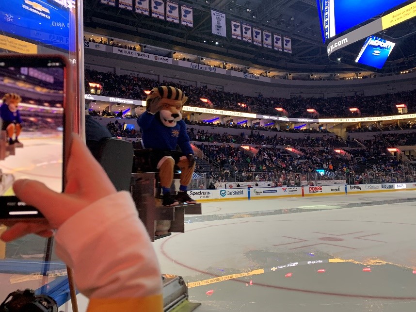 Leo waves as he rides the Olympia ice resurfacing machine at the Blues game on March 15 at the Enterprise Center. 