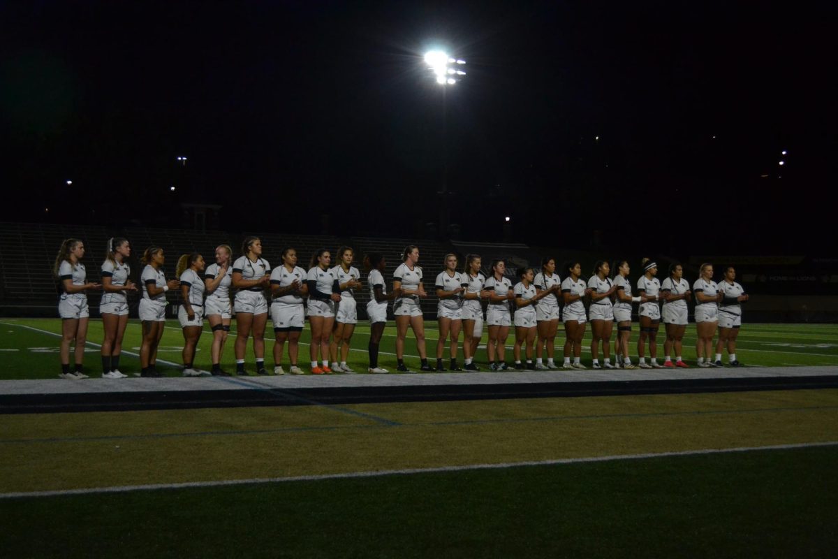 Womens rugby team starters lining up to be announced before the big game against Life University.