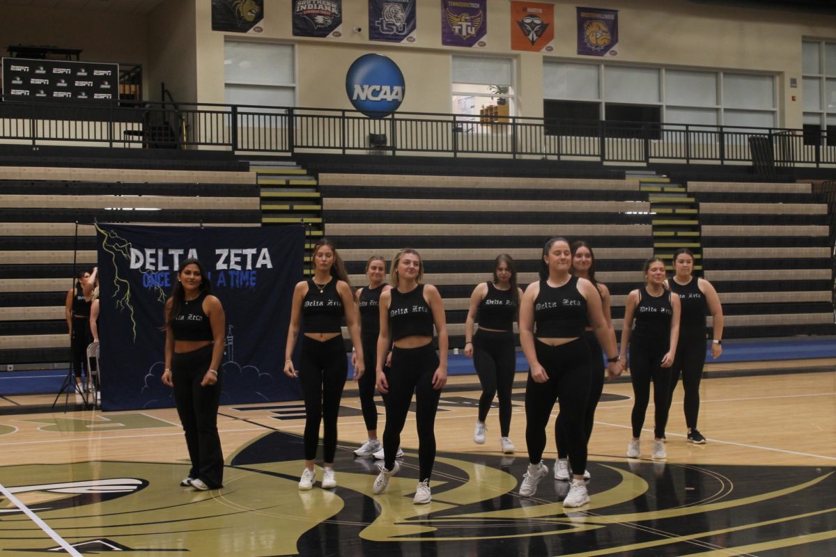 Members of Delta Zeta dance on the Hyland Arena court during the Lip Sync Battle. 