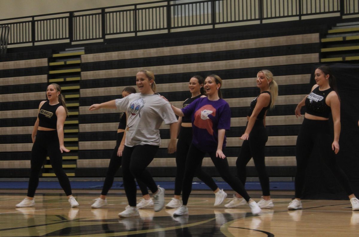 Members of the Lionettes and Lion Line dance teams dance during their performance at Lip Sync. 
