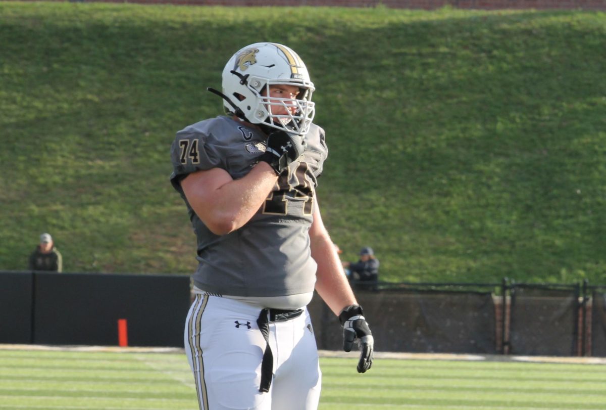 Offensive lineman Ethan Johnson looks downfield during a game against Bryant University. 