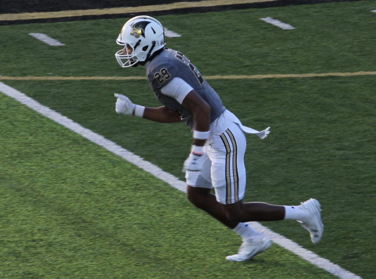 Wide receiver Jalen Smith prepares to run a route in a game against Bryant University