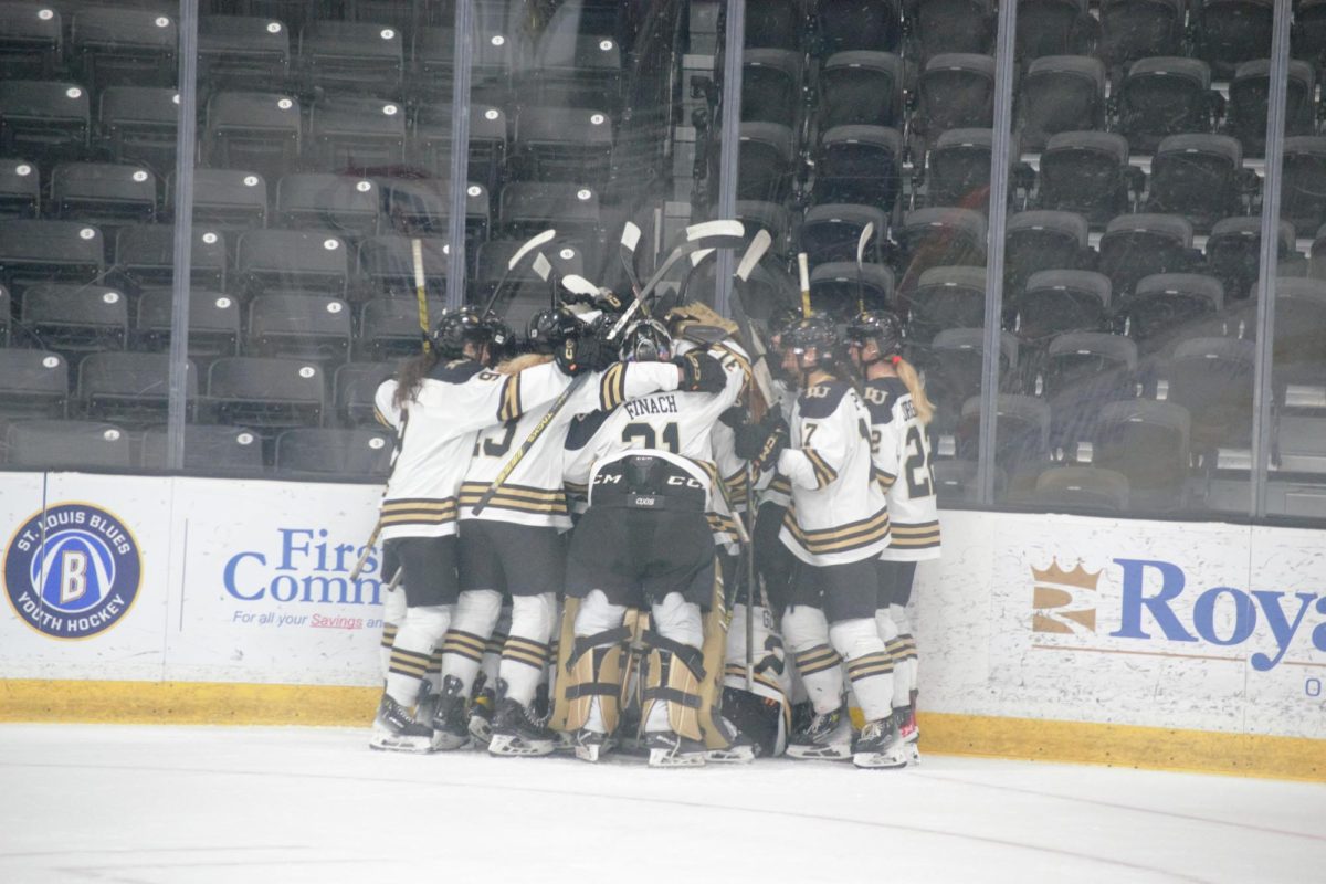 The Lions celebrate Sarah Davies game-winning goal against the Rochester Institute of Technology. 