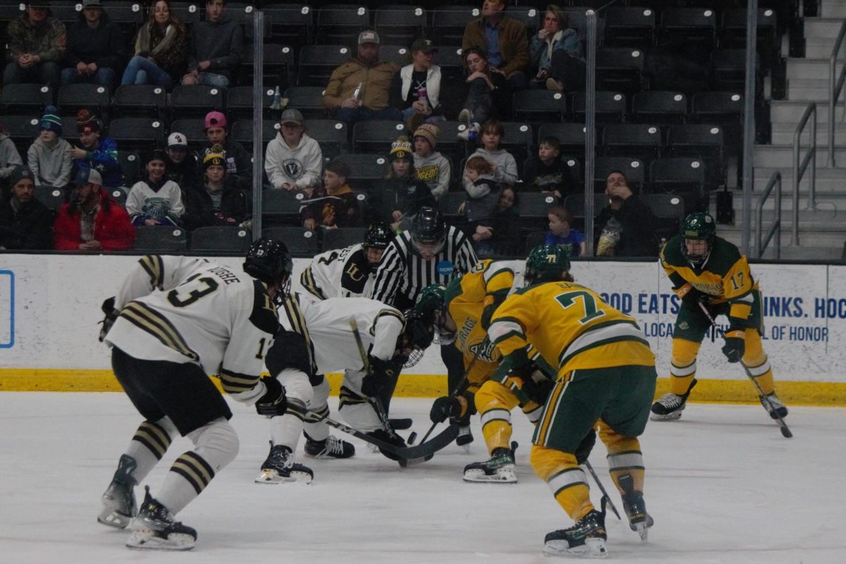 The Lions and the Alaska Anchorage Seawolves prepare for a faceoff.