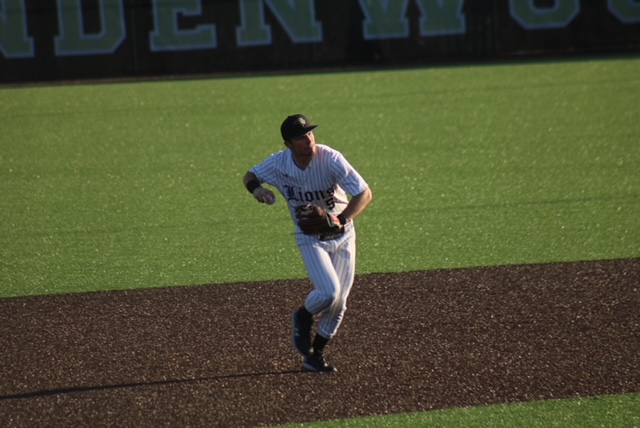Evan Funkhouser fields a ball in a game against St. Louis University. 