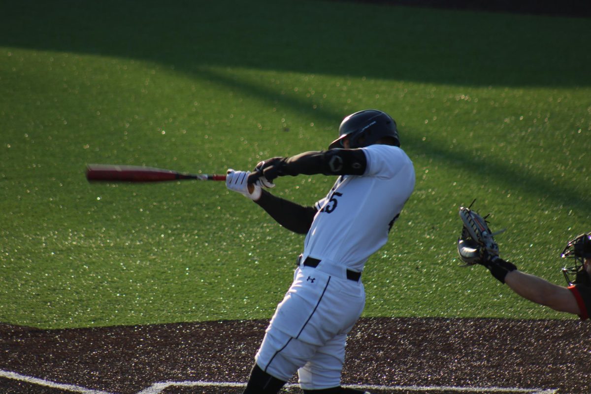 Jack Meyer swings at a pitch in a game against Omaha. 