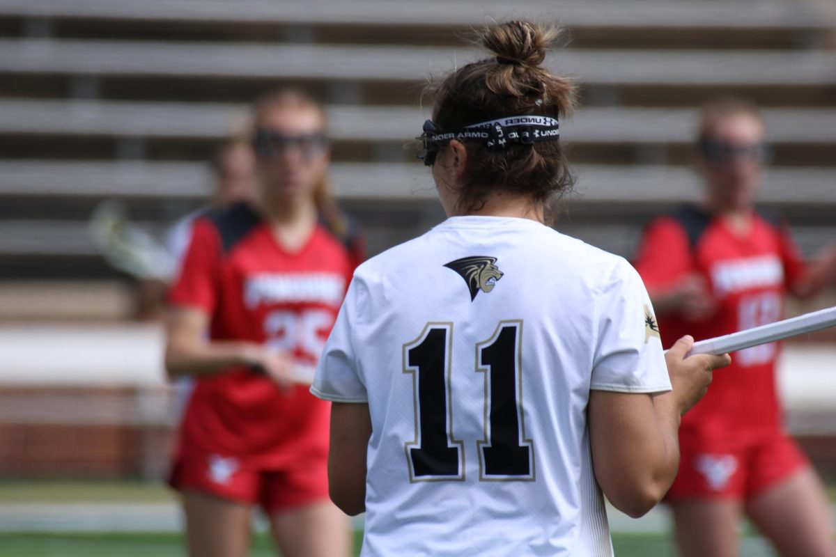 Natalie Gane prepares to pass the ball in a game against Youngstown University 